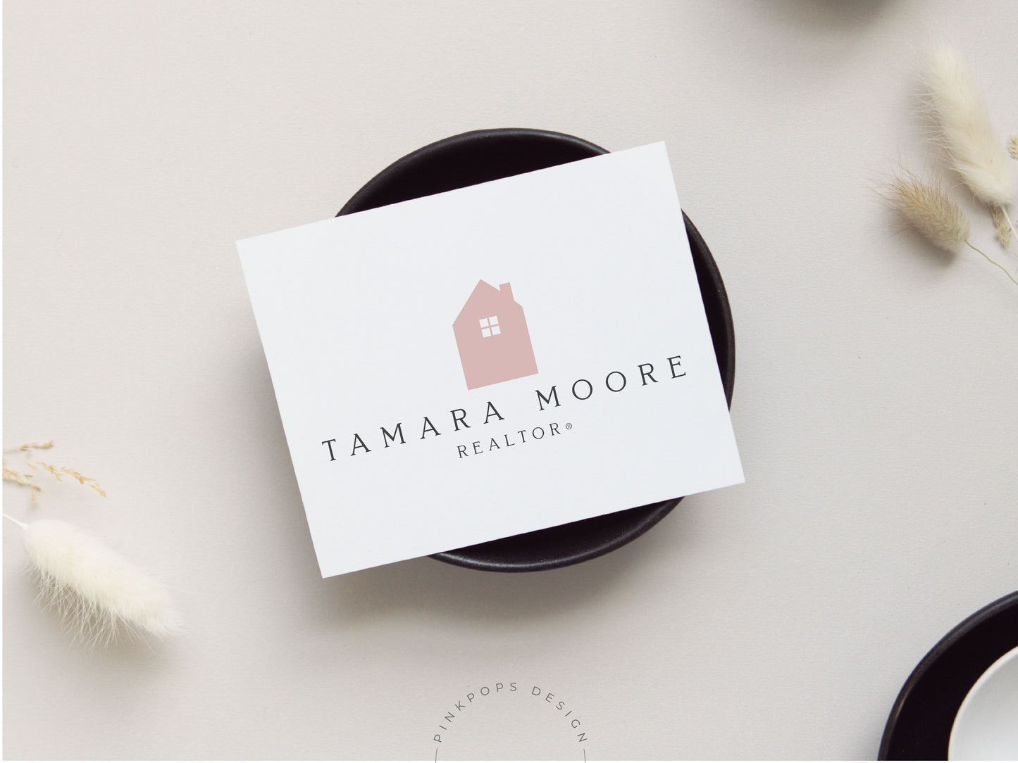 Real Estate Blush Pink Tamara Moore Logo Template - Gracefully designed logo in blush pink, perfect for real estate professionals, radiating sophistication and charm.